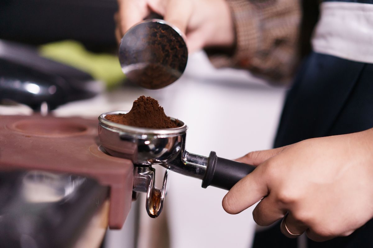 Barista showing process making a coffee